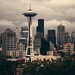 SEATTLE, WA - AUG 14: Space Needle and city downtown on August 14, 2015 in Seattle. Seattle is the largest city in both the State of Washington and the Pacific Northwest region of North America